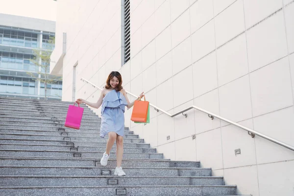 Happy Asian Woman Going Stairs Two Hands Holding Colorful Shopping — ストック写真