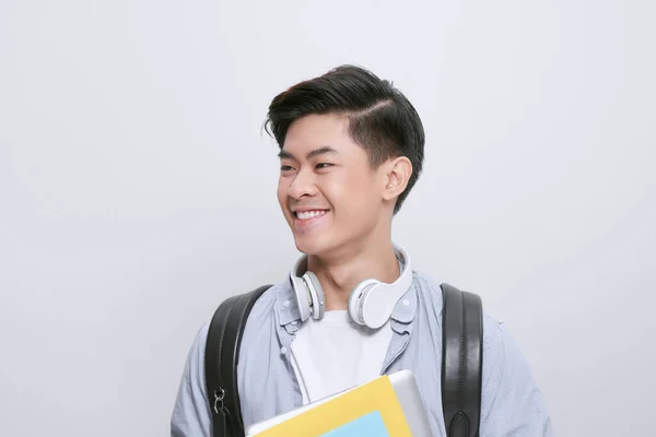 Portret Van Een Jonge Aziatische Student Met Boeken Geïsoleerd Een — Stockfoto