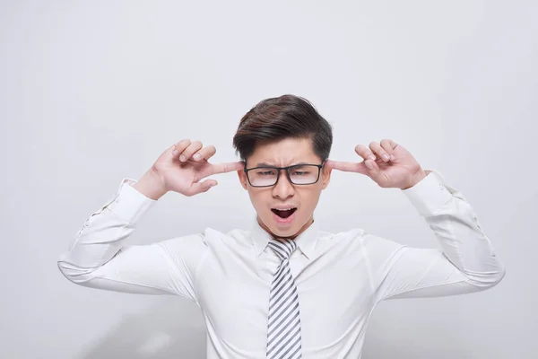 Handsome Asian Businessman Covering His Ears White Background — Stock Photo, Image