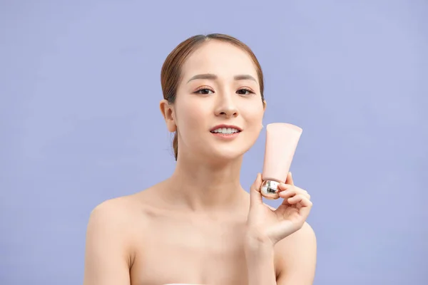 Asiático Mujer Mostrando Crema Mano Aislado Blanco —  Fotos de Stock