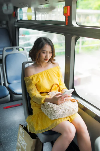 Young Asian Woman Using Her Cell Phone Public Transportation Bus — Stock Photo, Image
