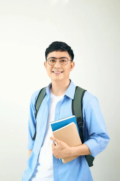Bonito Jovem Estudante Sorrindo Segurando Caderno Isolado Fundo Branco — Fotografia de Stock