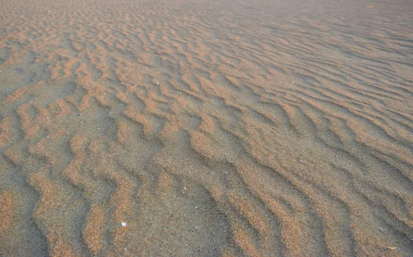 Hintergrund aus unberührtem Sand. — Stockfoto