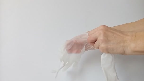 Women Hands Wear Thin Transparent Rubber Gloves Protect Health Viruses — Stock Video