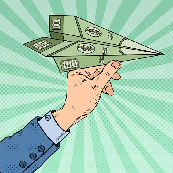 Pop Art Businessman Hand Throwing Dollar Paper Plane. Vector illustration — Stock Vector