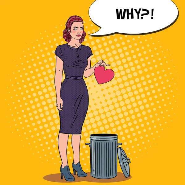 Unhappy Beautiful Woman Throws Her Heart in the Trash. Breakup. Pop Art Vector illustration — Stock Vector