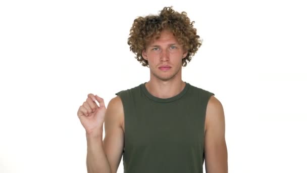 Blond Cheerful Guy With Curly Hair Posing On Camera Playing Like