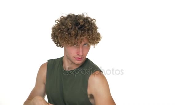 Caucasian Amusing Curly Guy Having Fun Happily Clapping Showing