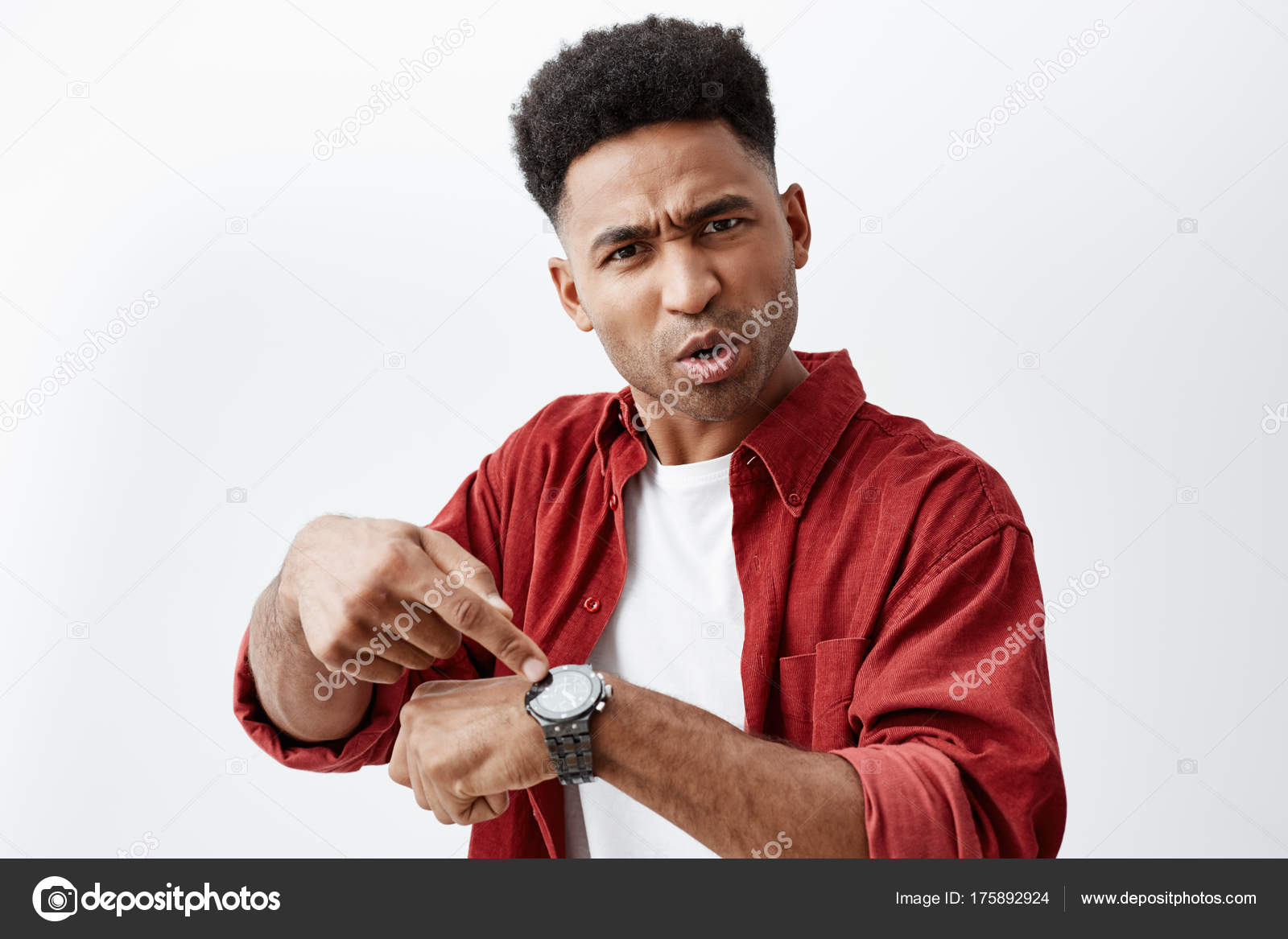 Close Up Of Good Looking Dark Skinned Man With Dark Curly