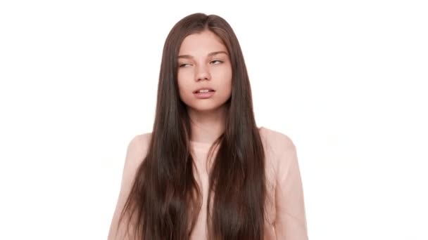Studio Portrait Of Funny Female Teen Showing Mood Swings With Facial Expressions Jump From Happiness To Boredom Over White Background Concept Of Emotions