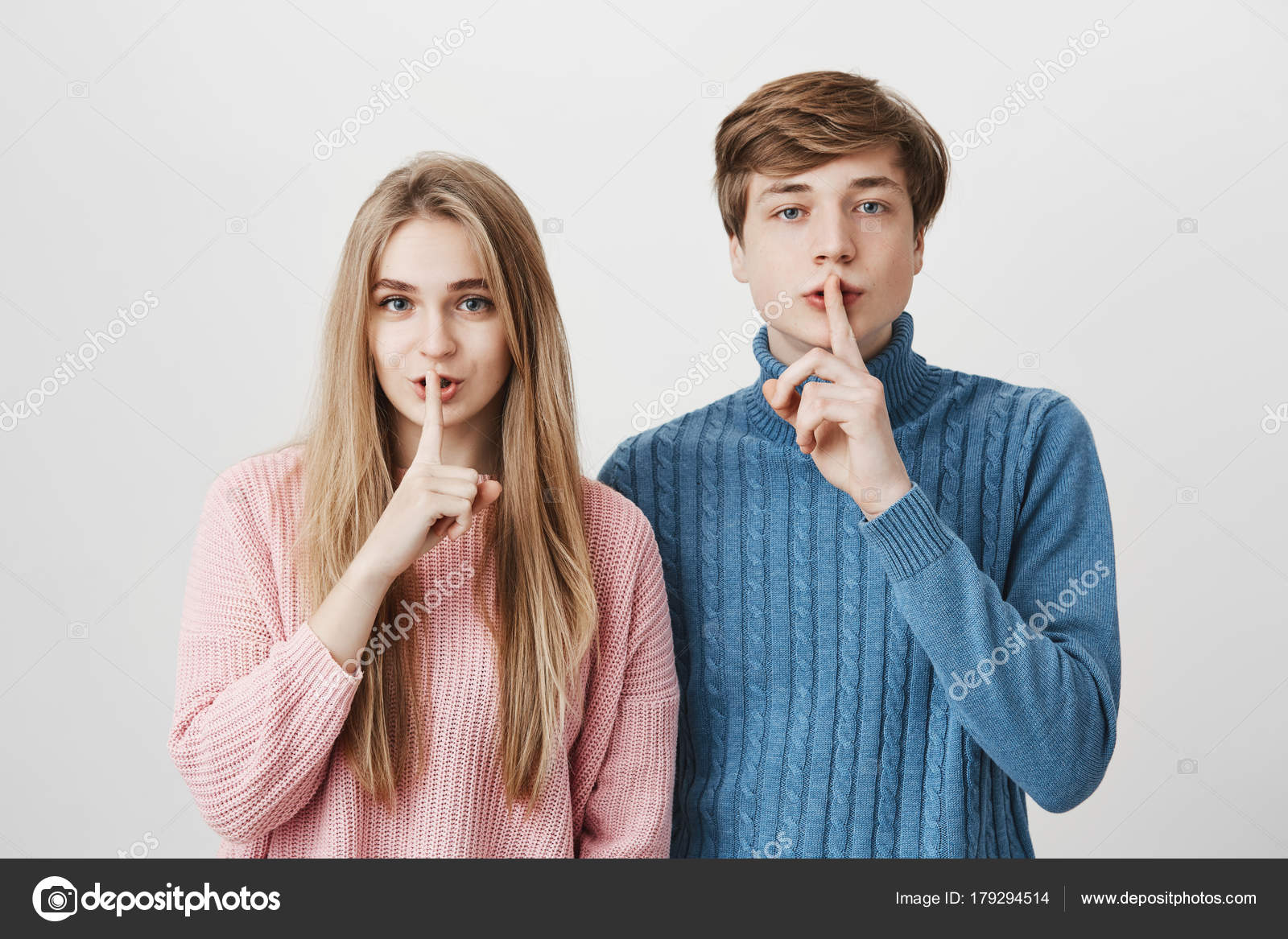 Emotional Young European Man And Woman With Blonde Hair Dressed In