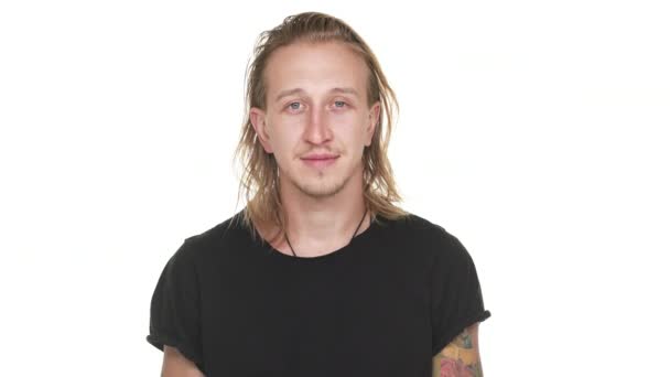 Portrait Of Young Blonde Man With Blue Eyes Showing Ok Or Alright