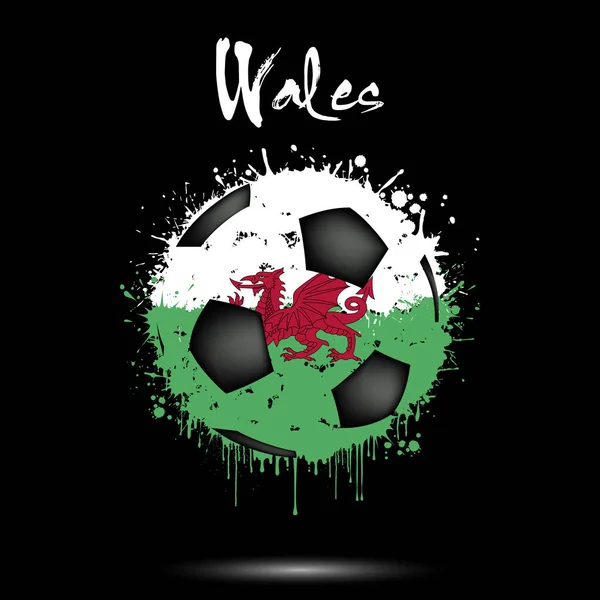 Pelota de fútbol en los colores de la bandera de Gales — Vector de stock