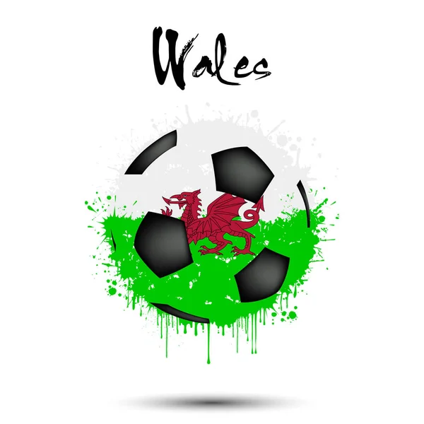 Pallone da calcio nei colori della bandiera gallese — Vettoriale Stock