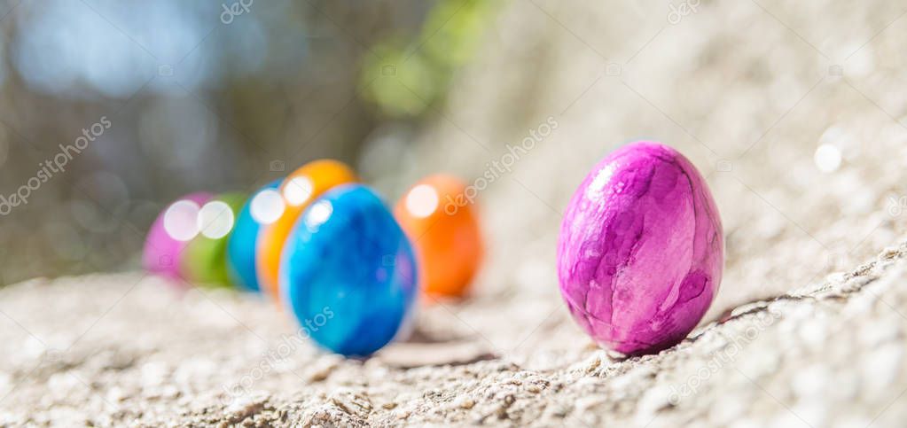 Easter egg on a stone