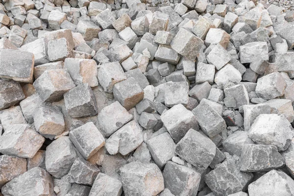 De nombreuses pierres de granit pour revêtement routier — Photo