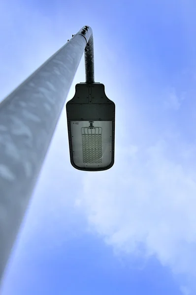 Lamp post and sky background Royalty Free Stock Images