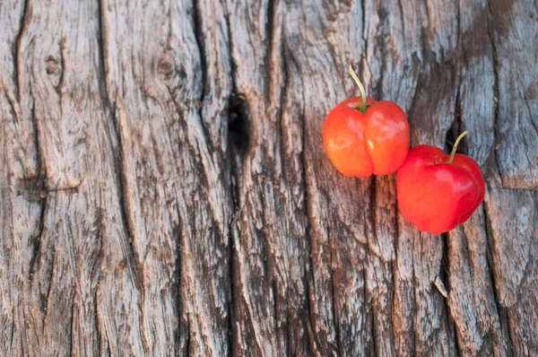 Acerola plody na pozadí — Stock fotografie