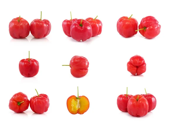 Acerola fruit aangezet close-up achtergrond — Stockfoto