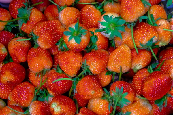 strawberries texture close up on background.