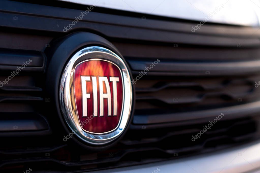 Berlin, Germany - October 31, 2019: Fiat logo. In October 2019 Frances PSA, owner of Peugeot, and Fiat Chrysler have agreed to pursue a merger that would create the worlds fourth largest carmaker