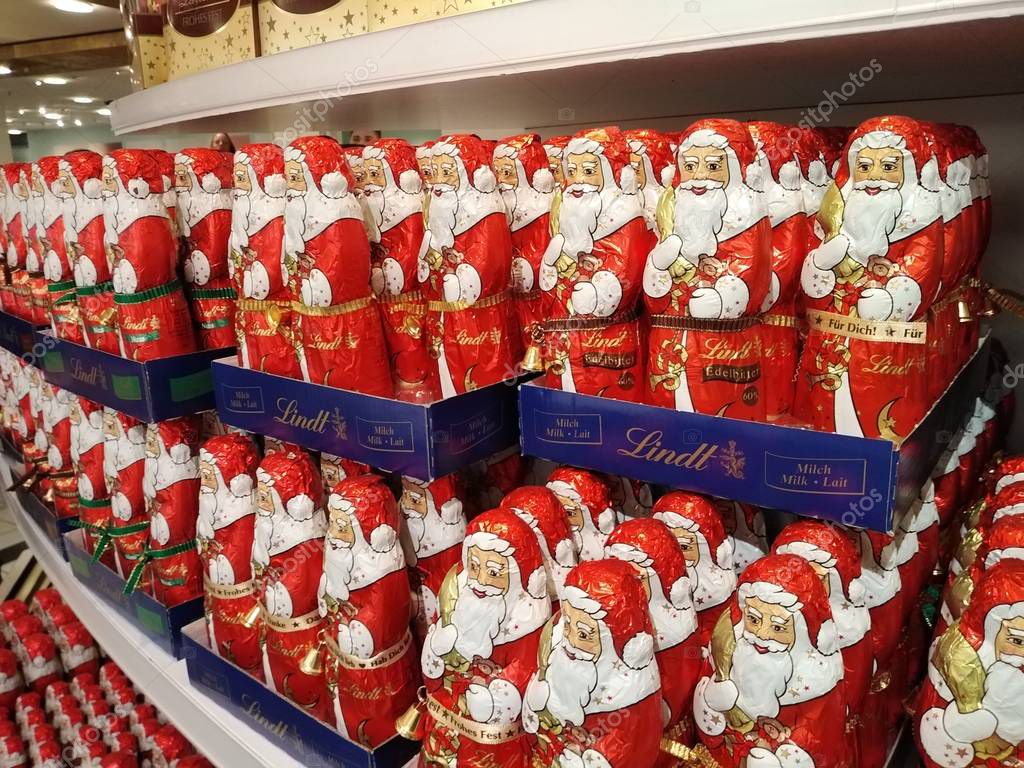 Berlin, Germany - December 11, 2019: Lindt Chocolate Santa Claus figurines. Lindt and Spruengli AG is a Swiss chocolatier and confectionery company founded in 1845 and known for truffles and bars