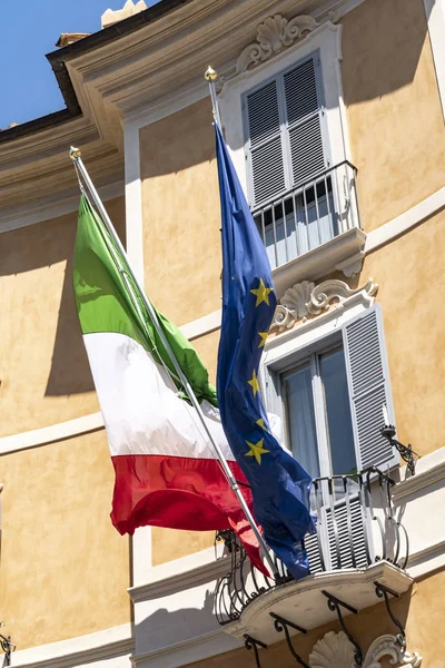 Italian and European flags fluttering