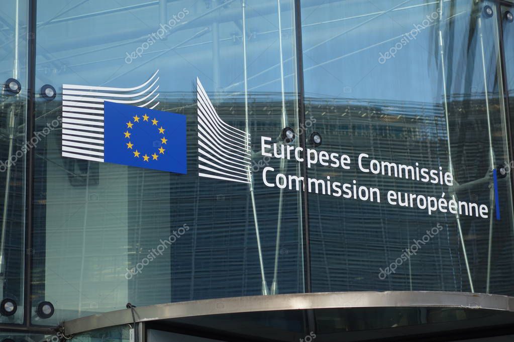 Brussels, Belgium - December 24, 2019: Signage of the European Commission at the entrance of the Berlaymont building, headquarters of the European Commission