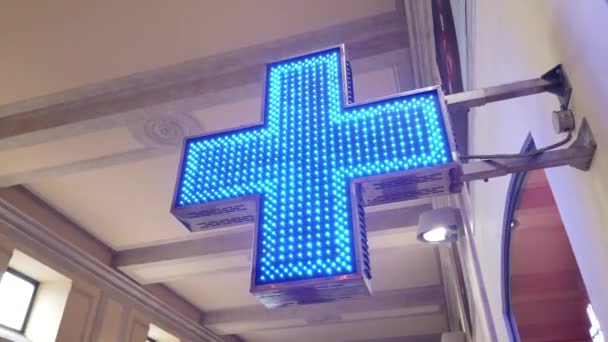 Blinking Blue Cross Pharmacy Sign — Stock Video