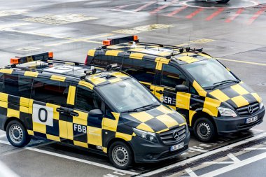 Berlin, Germany - February 3, 2020: Mercedes-Benz Vito vans Follow-Me-Cars at Berlin Schnefeld Airport