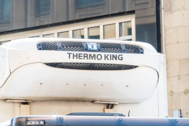 Berlin, Germany - June 11, 2019: Thermo King sign on a white lorry. Thermo King Corporation is an American manufacturer of transport temperature control systems for trucks and trailers clipart