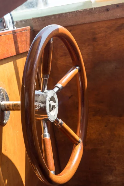 Wooden ship\'s wheel or boat helm