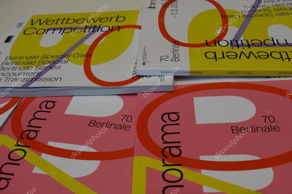 Berlin, Germany - February 22, 2020: Magazines of 70th Berlinale - Berlin International Film Festival 2020. The bear is the symbol of the Festival