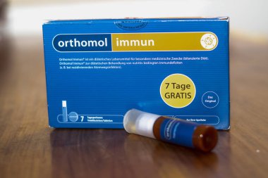 Berlin, Germany - February 21, 2020: Pack of Orthomol Immun bottles, pharmaceutical  food supplement useful to strengthen the immune system