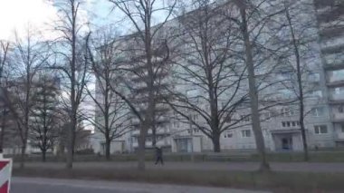 Berlin, Germany - February 29, 2020: Karl Marx Allee avenue, monumental socialist boulevard built by the GDR between 1952 and 1960 in Berlin Friedrichshain and Mitte, now named after Karl Marx