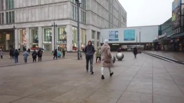 Berlin, Germany - January 9, 2020: Alexanderplatz, large public square in the Mitte district, the most visited area of the German capital city. In the centre, the Fountain of International Friendship