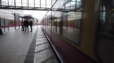 Berlin, Germany - January 9, 2020: German S-Bahn trains passing through Alexanderplatz railway station