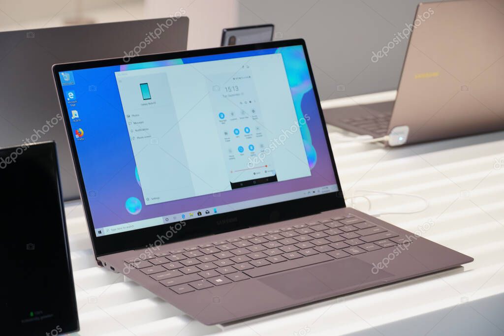 Berlin, Germany - September 10, 2019: Samsung smartphone and computer displayed for sale in an electronics store. Samsung Group is a South Korean multinational company producing consumer electronics