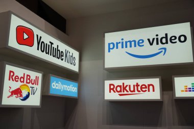 Berlin, Germany - September 10, 2019: Advertising banner of Prime Video, Rakuten, Youtube Kids, Dailymotion, Red Bull Tv clipart