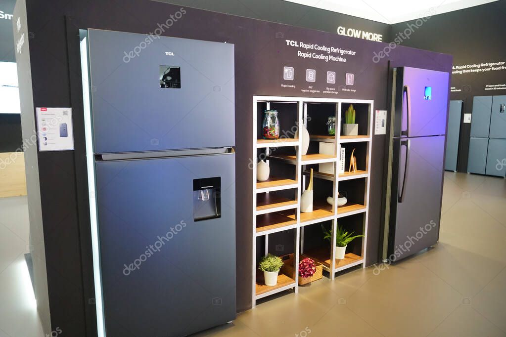 Berlin, Germany - September 10, 2019: TCL line AI x IoT, smart refrigerators and other home electronics products
