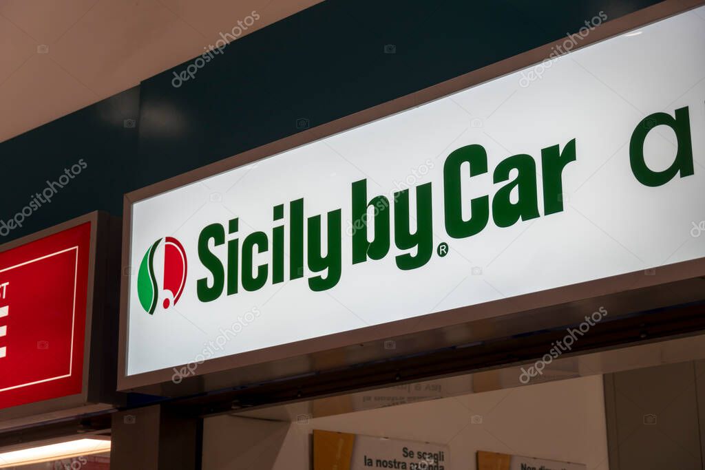 Bari, Italy - February 3, 2020: Signage of Sicily by Car. Autoeuropa, leader for low cost car hire in Southern Italy