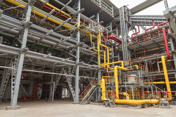 Steel pipelines. Industrial view at oil refinery plant