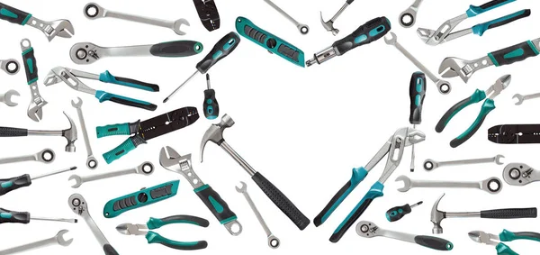 Heart shaped of service tools on white background