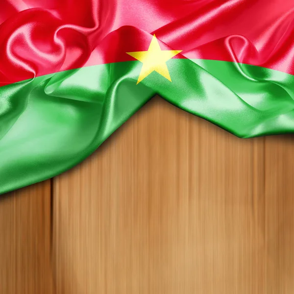 Розмахуючи прапором Буркіна-Фасо — стокове фото