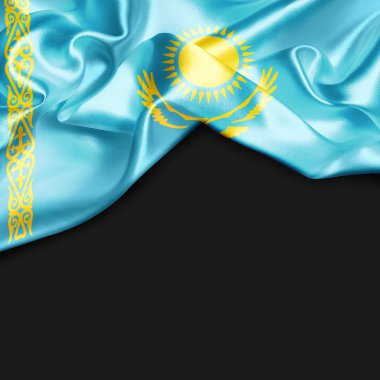 Kazakistan bayrağı sallayarak