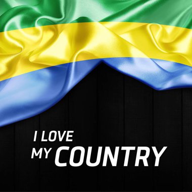 gabon Cumhuriyeti bayrağı sallayarak