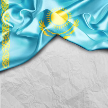Kazakistan bayrağı sallayarak