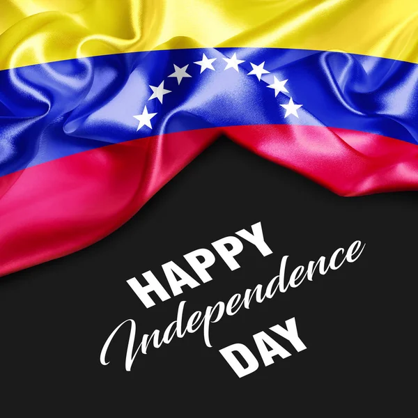 Venezüella bayrağı sallayarak