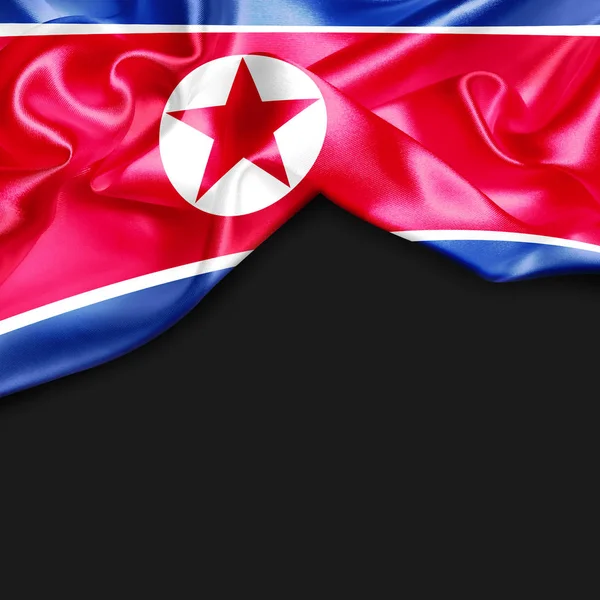 Acenando bandeira da Coréia do Norte — Fotografia de Stock
