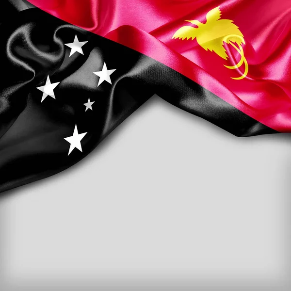 Розмахуючи прапором Папуа — Нової Гвінеї — стокове фото